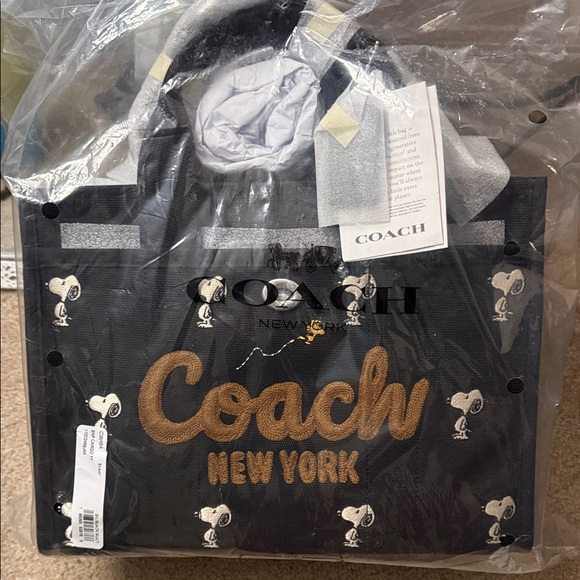 Coach Handbags - Coach Black Cargo Tote with Tan Embroidered Logo and Limited Snoopy Collection